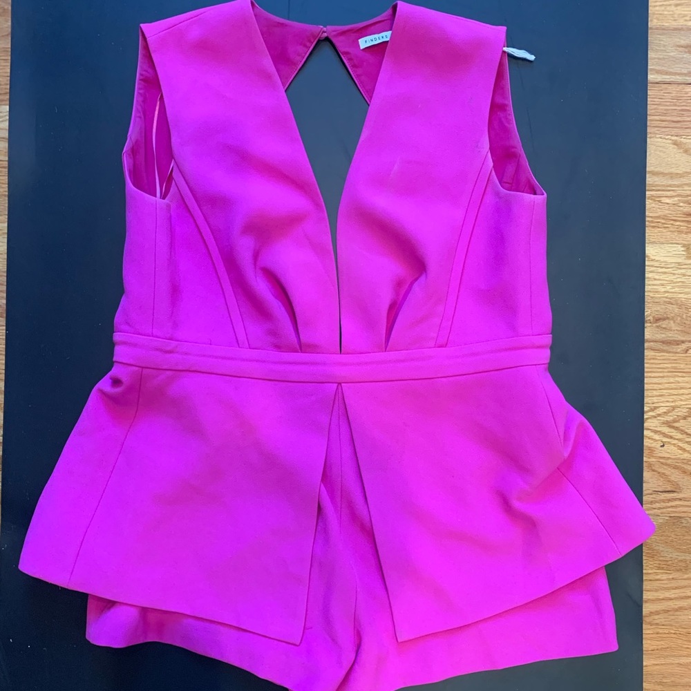 Pink romper with open back. Barely worn! Size 2